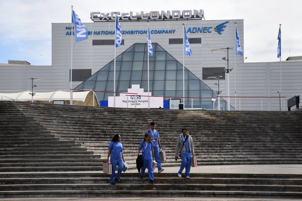 NHS workers leaving the NHS Nightingale London at the ExCel centre. It treated 54 Covid-19 patients in the first wave of the pandemic in spring 2020.