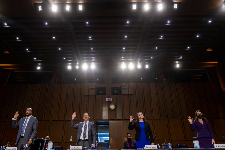 Witnesses are sworn in at the Senate Judiciary Committee hearing on gun violence on March 23, 2021. 