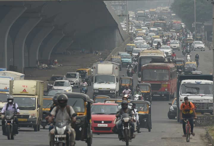 Huge traffic is seen in Mumbai, India, after local train services stopped due to a power failure, Oct. 12, 2020.