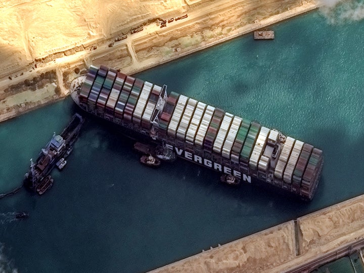 High-resolution satellite imagery of the container ship that remains stuck in the Suez Canal.