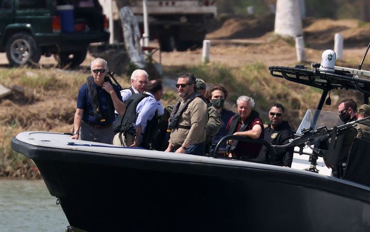 Sens. Ted Cruz (R-Texas) and Lindsey Graham (R-S.C.), third and fifth from left, are seen with others aboard a Texas Departme
