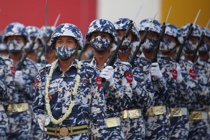 Military personnel participate in a parade on Armed Forces Day in Naypyitaw, Myanmar, Saturday, March 27, 2021. 