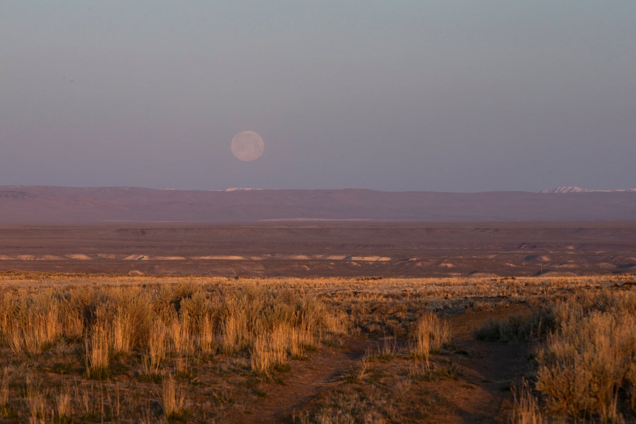 Sunrise over the sagebrush as the moon sets outside Rome, Oregon, on Sunday, March 28.