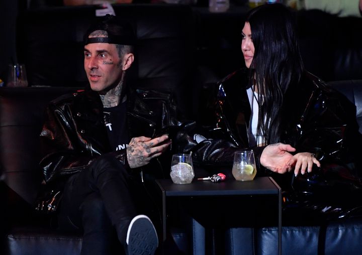 Travis Barker and Kourtney Kardashian are seen in attendance during the UFC 260 event at UFC APEX on March 27.