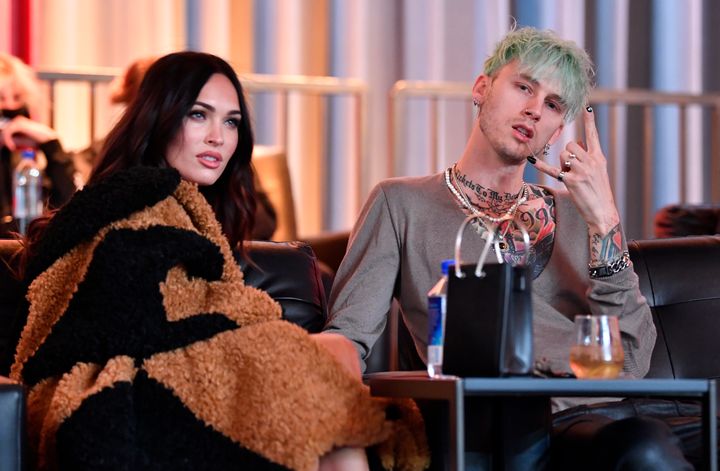 Megan Fox and Machine Gun Kelly are seen in attendance during the UFC 260 event at UFC APEX on March 27 in Las Vegas, Nevada.