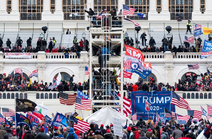 Trump supporters occupy the West Front of the Capitol and the inauguration stands during the January 6 insurrection