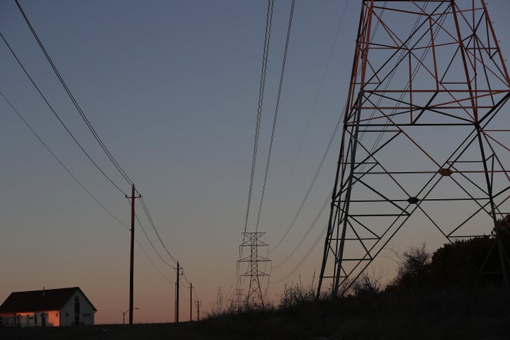 Electric power lines run through a neighborhood in Austin, Texas, where blackouts caused by a freak cold snap underpinned the