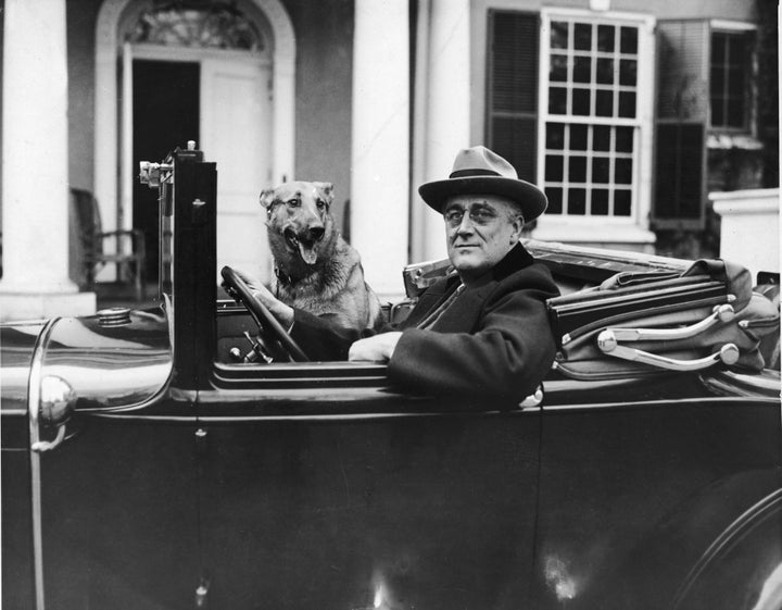 President Franklin Delano Roosevelt and Major outside their home in Hyde Park, New York.