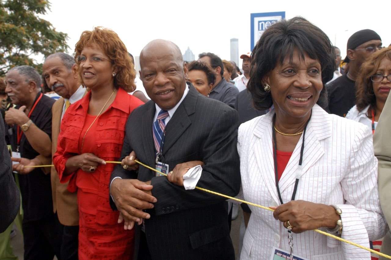 AME Bishop Vashti McKenzie, Rep. John Lewis (D-Ga.) and Rep. Maxine Waters (D-Calif.) head down Atlanta's Martin Luther King Boulevard during the Keep the Vote Alive March and Rally on Aug. 6, 2005. The historic 1965 Voting Rights Act is up for renewal in Congress.
