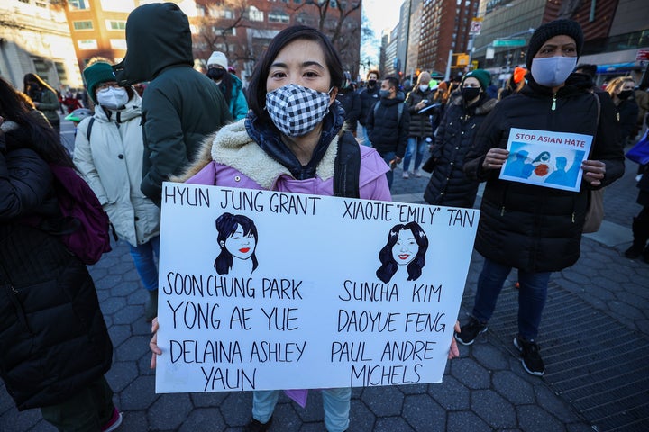 New Yorkers gather for a peace vigil to remember the Atlanta-area spa shooting victims at Union Square on March 19, 2021.