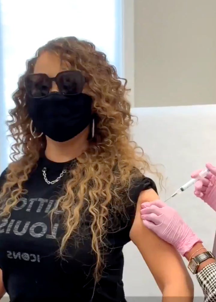 Mariah Carey gets her first Covid-19 vaccine in typically extra fashion