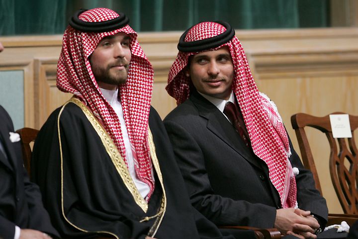 Prince Hamza Bin Al-Hussein, right, and Prince Hashem Bin Al-Hussein, left, brothers King Abdullah II of Jordan, attend the o