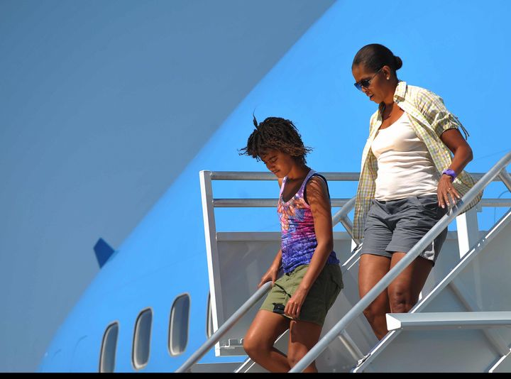 First lady Michelle Obama and daughter Malia step off Air Force One August 16, 2009, upon arrival at Grand Canyon National Park Airport in Arizona.