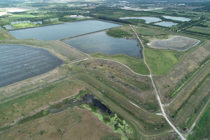 A reservoir of an old phosphate plant was recently found leaking, igniting fears that it may suddenly collapse and flood the