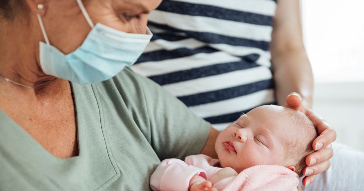 Should You Get The COVID-19 Vaccine Before Meeting A Newborn?