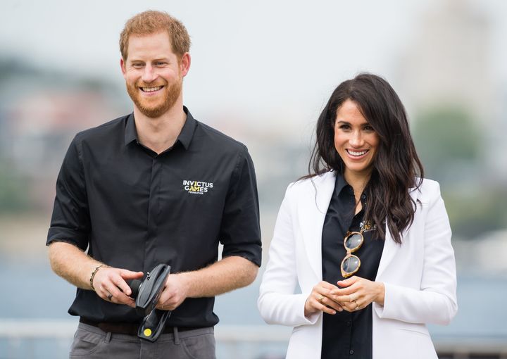 The Duke and Duchess of Sussex attend the Jaguar Land Rover Driving Challenge at the Invictus Games on Oct. 20, 2018, in Sydney, Australia.