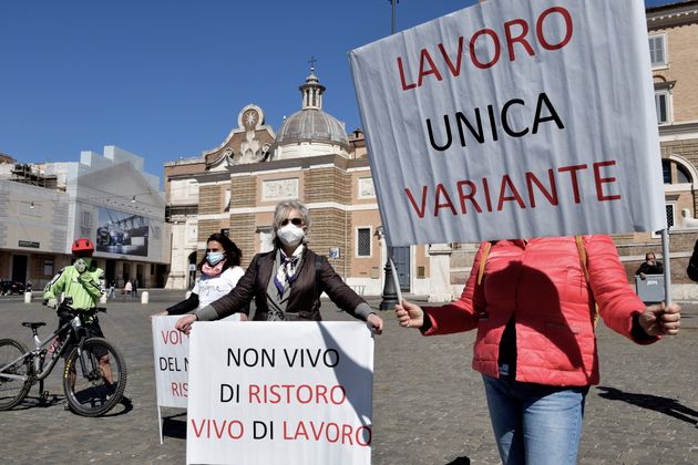 ROME, ITALY - APRIL 08: People participate in the demonstration in Piazza del Popolo to demand economic...