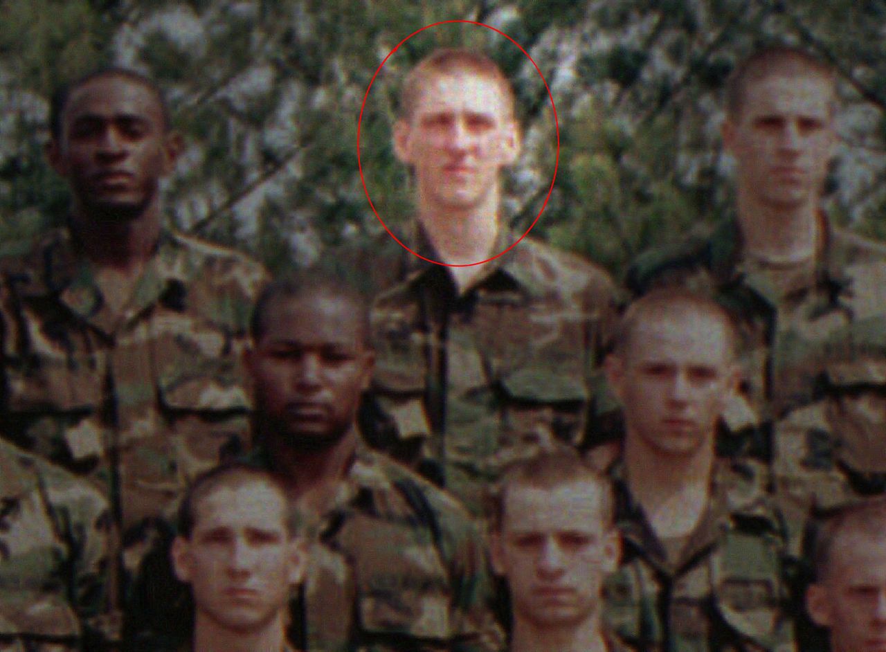 Timothy McVeigh, top center, poses with members of his platoon during a break in infantry training at Ft. Benning, Georgia, June 3, 1988. McVeigh would go on to carry out a bombing in Oklahoma City in 1995, killing 168 people.