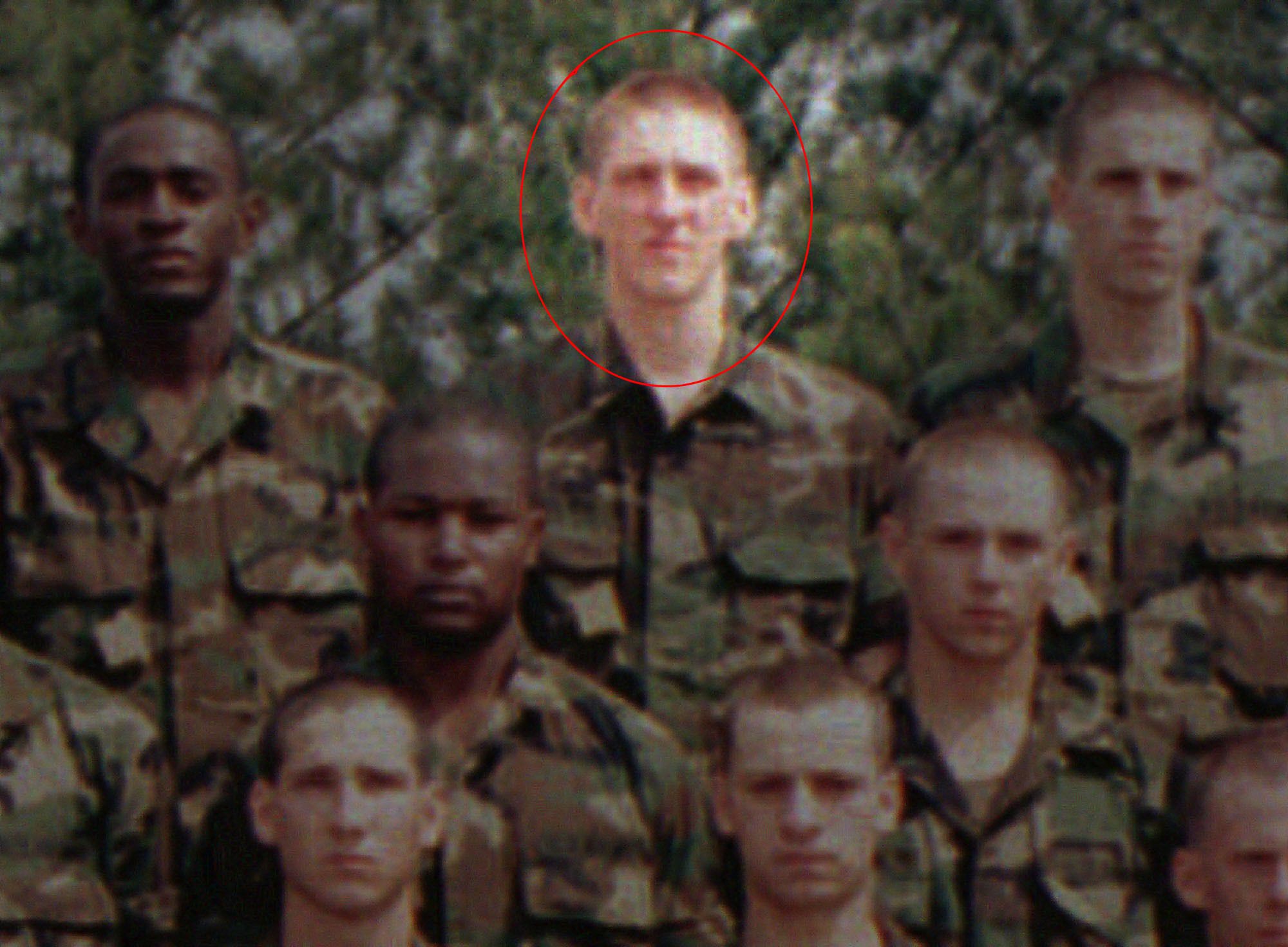 Timothy McVeigh, top center, poses with members of his platoon during a break in infantry training at Ft. Benning, Georgia, J