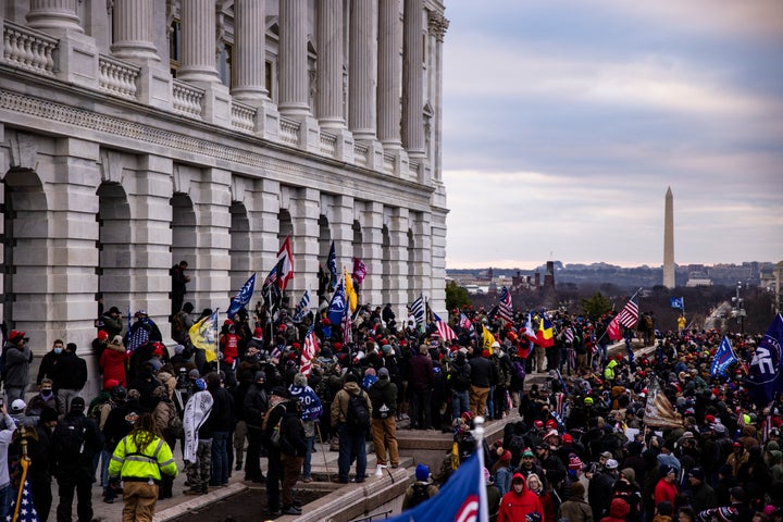 WASHINGTON, DC - JANUARY 06: A pro-Trump mob storms the U.S. Capitol following a rally with President Donald Trump on January