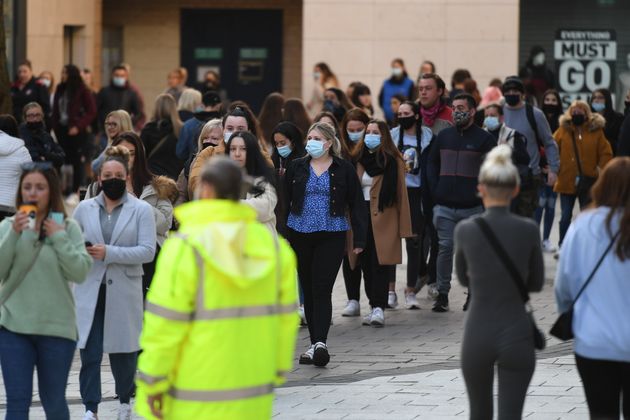 Shoppers queue outside Primark from 7am as non-essential retail reopens on April 12, 2021 in Cardiff.