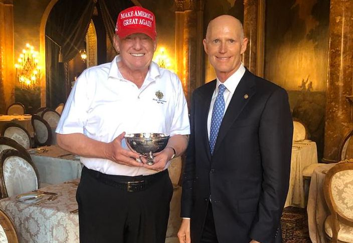 Sen. Rick Scott presented President Donald Trump with a tiny ceremonial bowl.