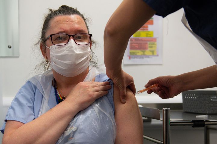 A nurse is given the Oxford/AstraZeneca Covid-19 vaccine in Coventry on January 7.