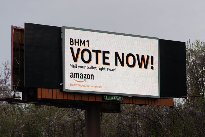 Amazon urged workers to cast their ballots as quickly as possible, even having a billboard put up on the interstate.