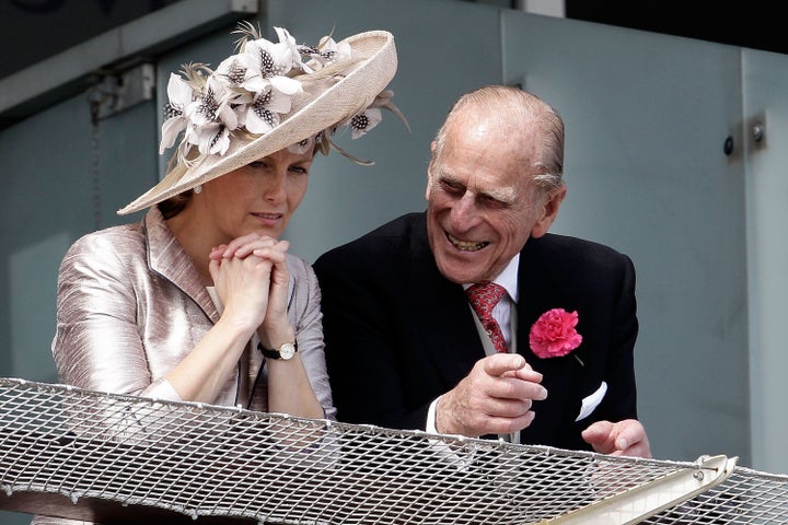 The Duke of Edinburgh (right) and Countess of Wessex wait for the start of the Epsom Derby on June 4, 2011, in Epsom, England.