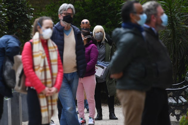 Members of the public queue for the COVID-19 testing centre at St John's Church in Waterloo, south London. Surge testing has begun in the boroughs of Lambeth and Wandsworth in south London following the identification of a number of cases of a variant of the virus first found in South Africa. Picture date: Tuesday April 13, 2021. (Photo by Victoria Jones/PA Images via Getty Images)