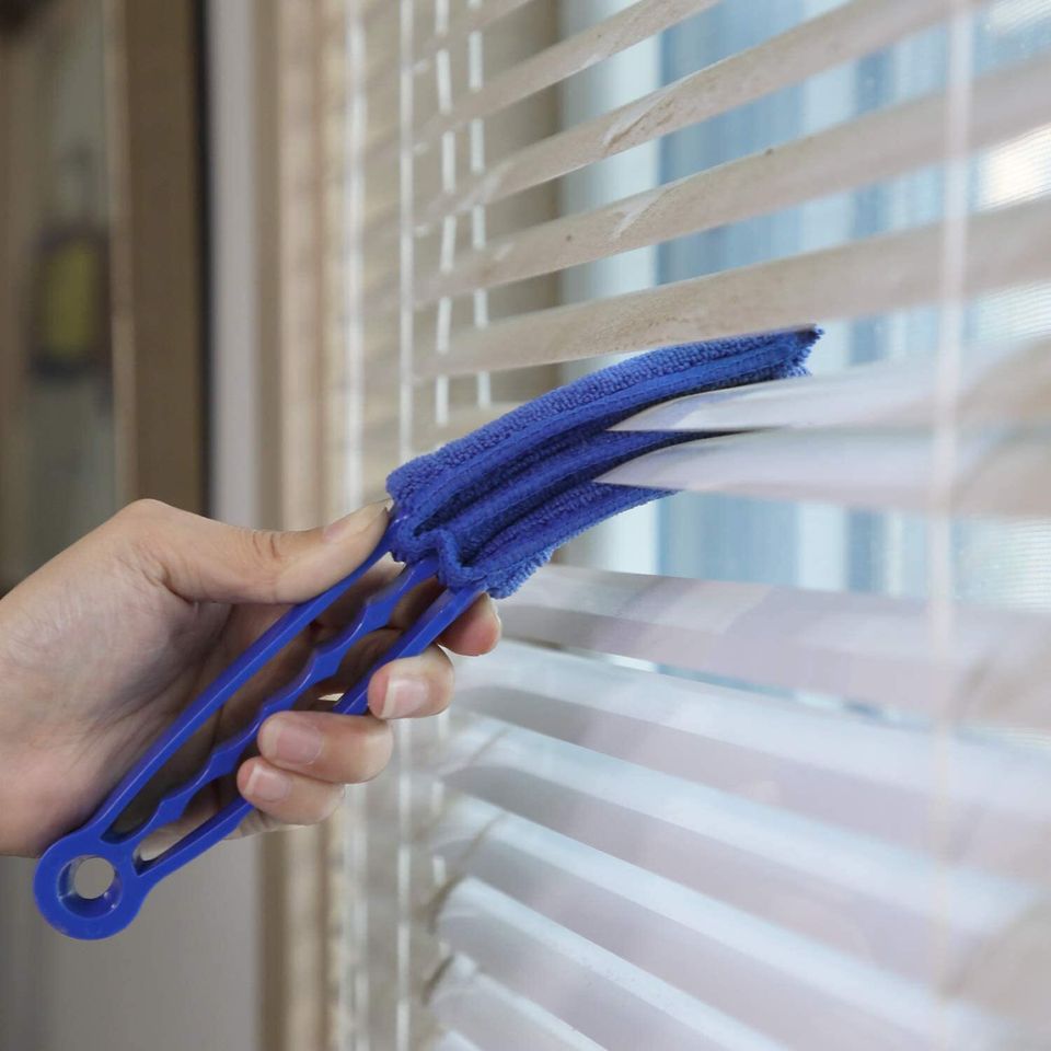 An adjustable blinds duster