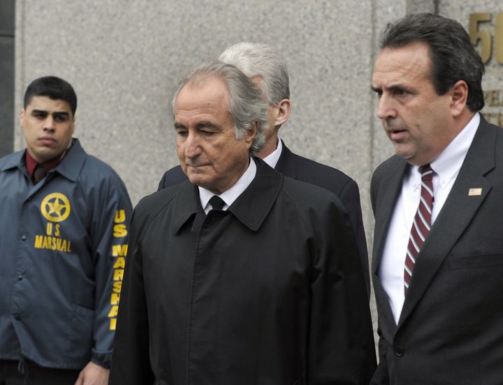 Disgraced Wall Street financier Bernard Madoff is seen leaving a federal court in 2009.