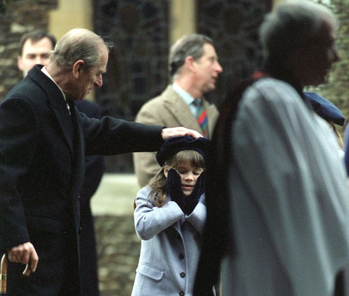 Prince Philip playing with his granddaughter, Princess Eugenie, in one of the photos that she shared on Instagram.&nbsp;