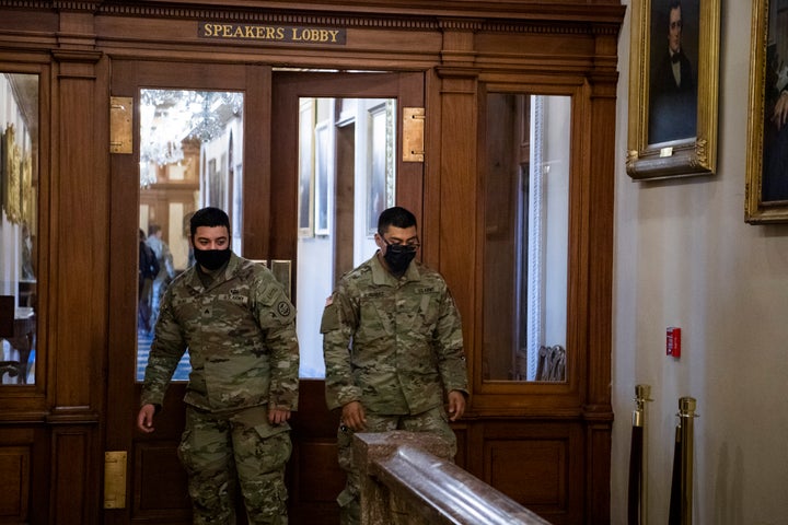 Members of the National Guard are seen in the Speakers Lobby at the door where Ashli Babbitt was killed during the Capitol riot on Jan. 6.