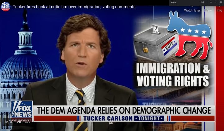 Tucker Carlson defends the white nationalist "great replacement" conspiracy theory on Fox News.