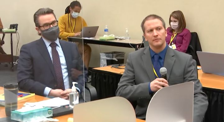 Defense attorney Eric Nelson (left) looks on as Derek Chauvin (right) tells Judge Peter Cahill on Thursday that he is invoking his Fifth Amendment right against self-incrimination and will not testify in his trial.