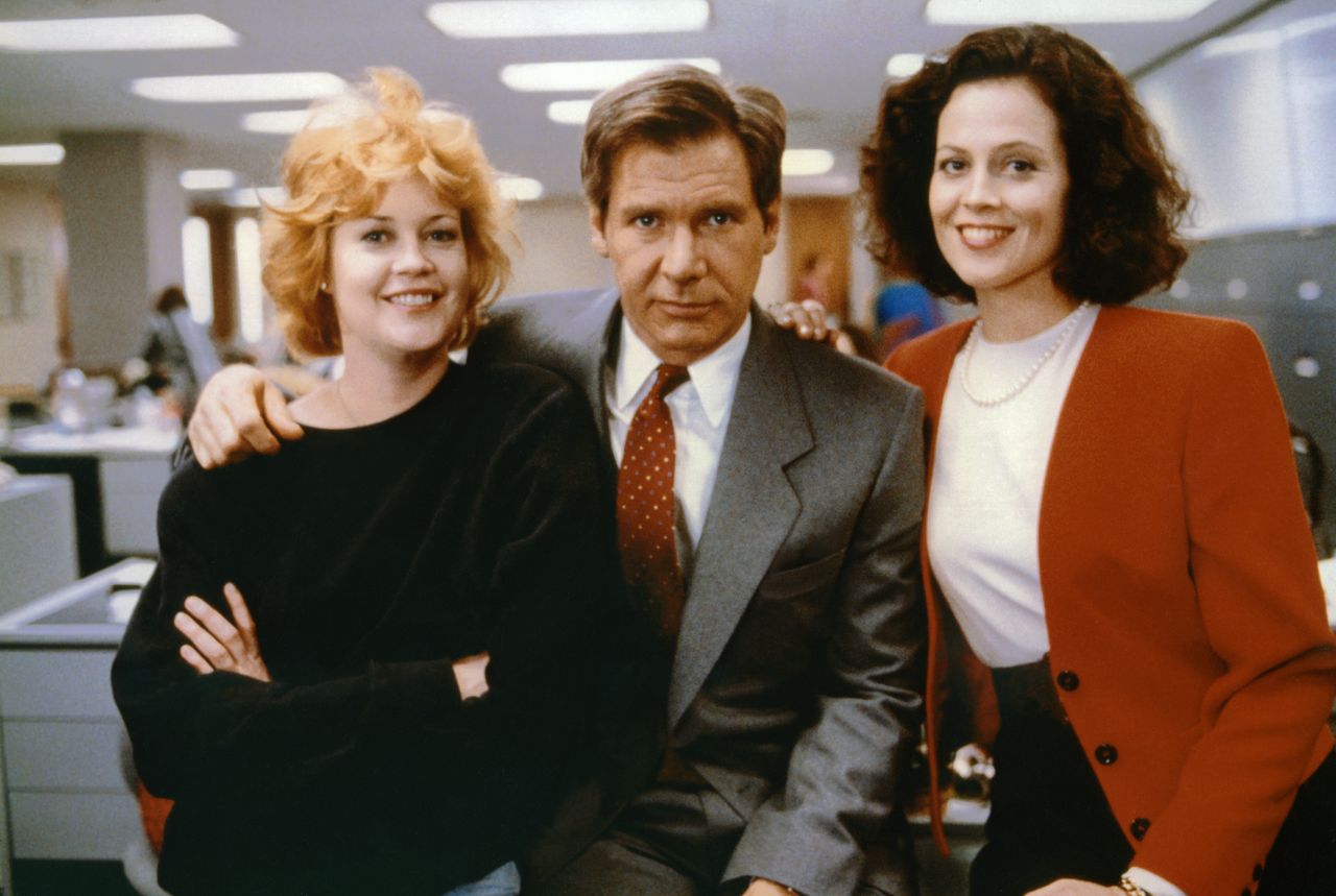 Melanie Griffith, Harrison Ford and Sigourney Weaver on the set of Working Girl in 1988