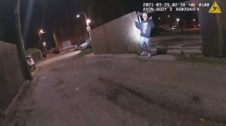 Body camera video shows 13-year-old Adam Toledo raising his hands as directed just before a Chicago police officer shot him d