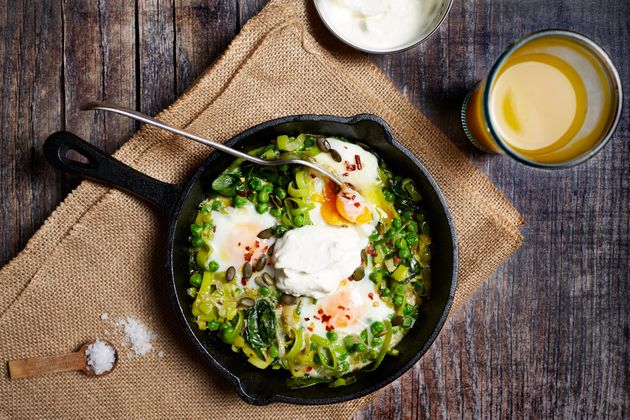 Green Baked Eggs with Peas, Leeks and Feta Seed Crumble. Recipe from Yes Peas!