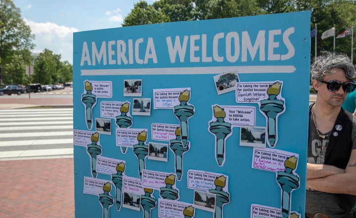 Guests at the America Welcomes Event with a Statue of Liberty replica shows solidarity with immigrants and refugees at Union Station on May 16, 2019, in Washington, D.C.