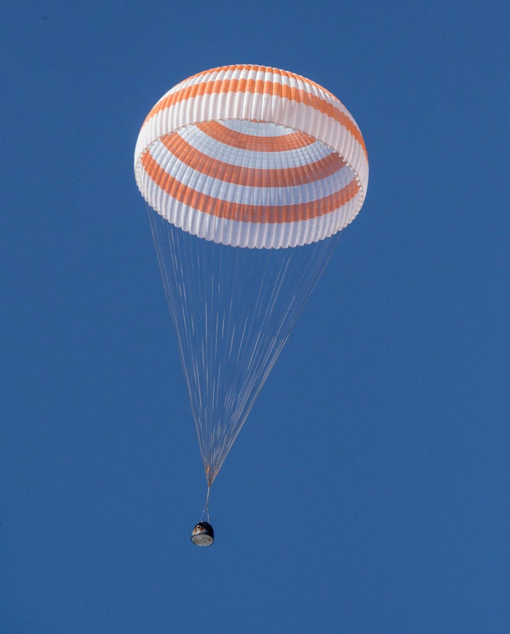 The Soyuz MS-17 spacecraft lands in a remote area near the town of Zhezkazgan, Kazakhstan, Saturday, April 17, 2021.