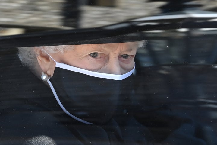 Britain's Queen Elizabeth II arrives in the Royal Bentley at the funeral for her husband, the Duke of Edinburgh, at St George