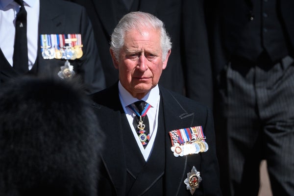 Prince Charles cries as he walks behind his father's coffin.&nbsp;