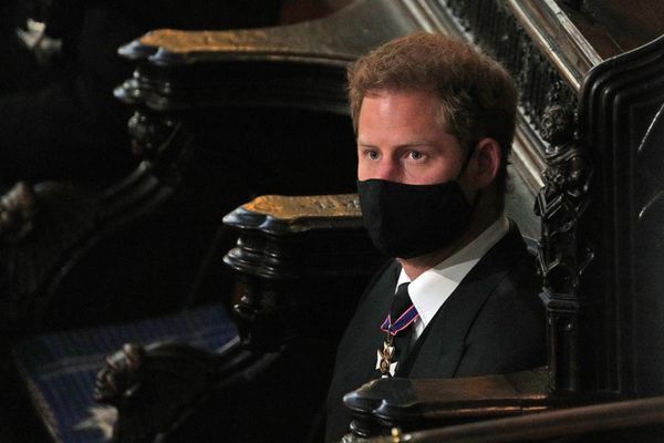 The Duke of Sussex sits alone, in accordance with COVID-19 guidelines, as he attends the funeral service of his grandfather.