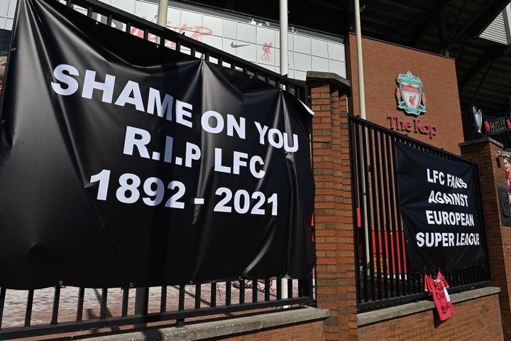 Anti-European Super League posters hang outside Anfield, home of Liverpool.