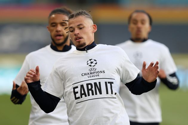 Kalvin Phillips of Leeds United warms up while wearing a protest T-shirt reading 