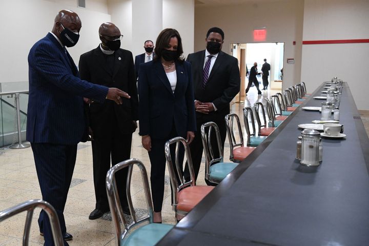 Harris is shown the once-segregated lunch counter from the original Woolworth's building as she visits Greensboro, North Carolina, on Monday.