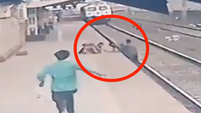 Hero Railroad Worker Rescues Young Boy From Tracks With Seconds To Spare Hero Railroad Worker Rescues Young Boy From Tracks With Seconds To Spare