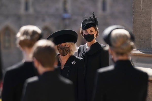 Camilla, Duchess of Cornwall and the Duchess of Cambridge arrive for the funeral.