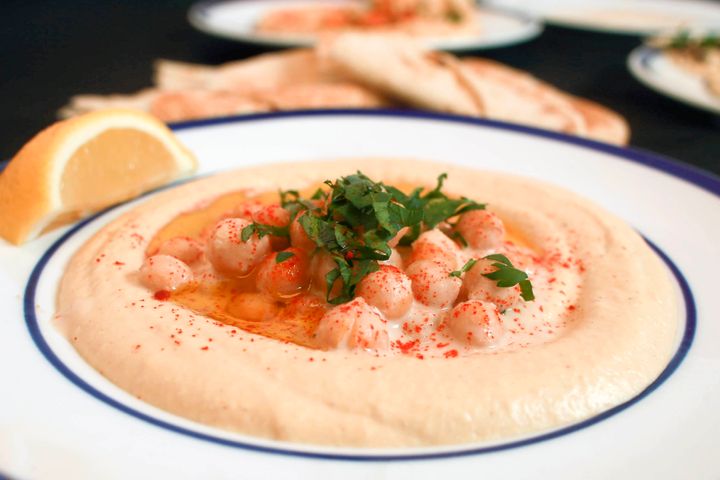 A dish of creamy hummus made by Michael Solomonov and Steven Cook.